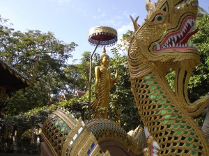 Buddha and a dragon outside the temple.